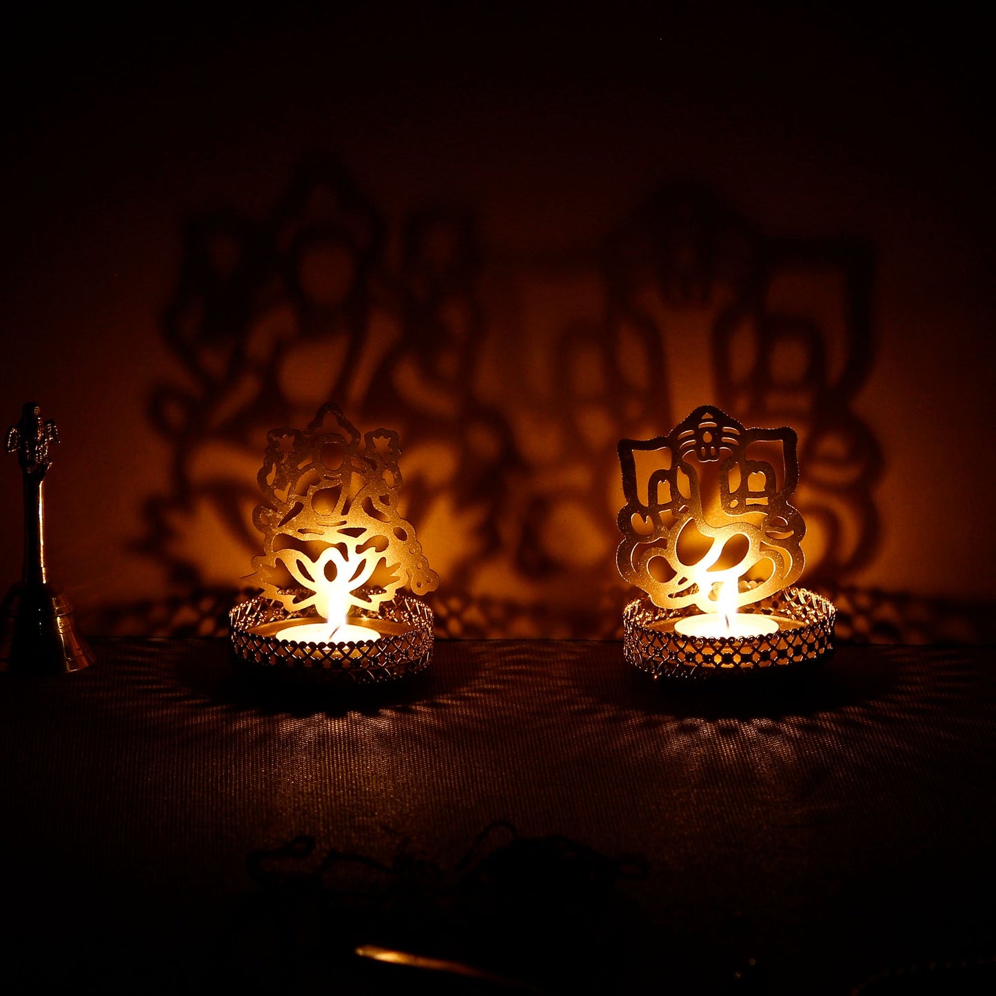 eCraftIndia Lord Ganesha and Laxmi Shadow Tea Light Holder - Premium  from Roposo Clout - Just $690! Shop now at Mystical9
